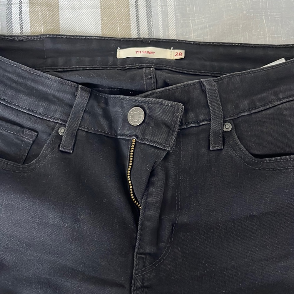 Levi’s 711 skinny black jeans